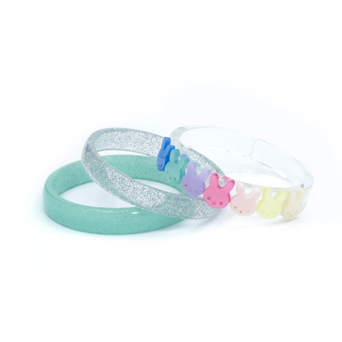 Set of three acrylic bracelets. One is silver glitter, one is mint glitter and the third one is clear with seven colorful bunny faces.